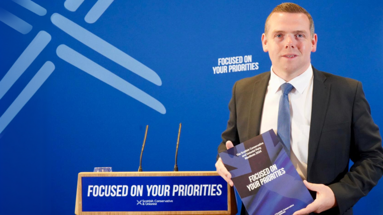 Douglas Ross holds the Scottish Conservative General Election manifesto 2024
